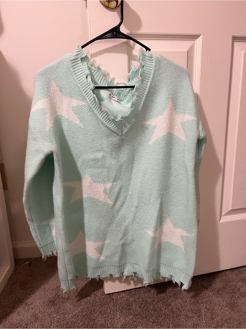 Distressed off the shoulder V-Neck Star Knit Sweater in Mint